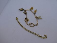 9ct yellow gold box link bracelet hung with 3 9ct gold charms, and four yellow metal examples, clasp