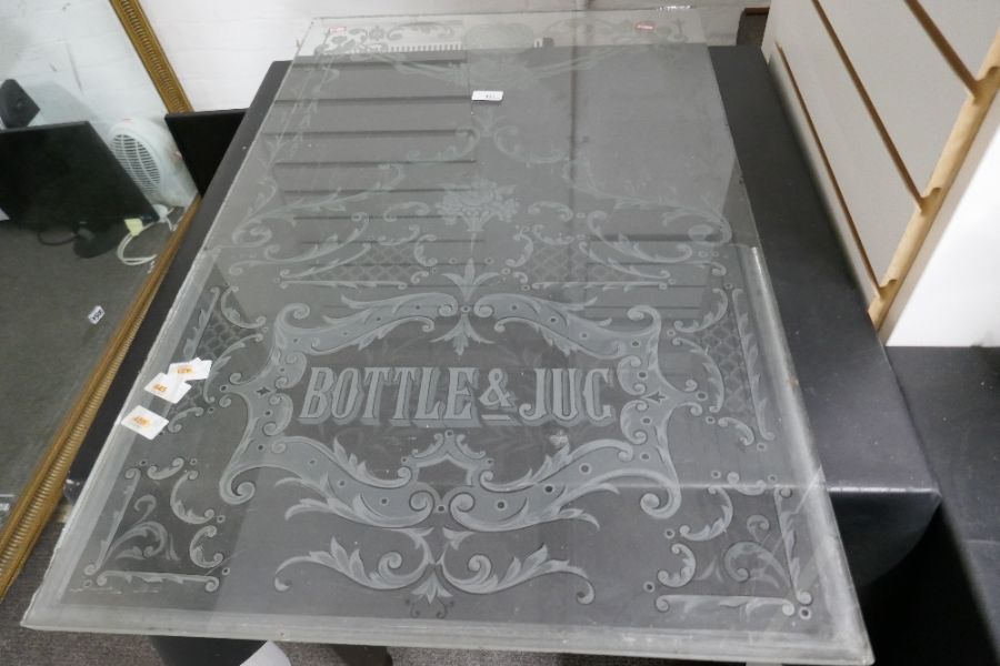 An old glass panel probably for a Public House door, 'Bottle and Jug', 57cm x 91cm
