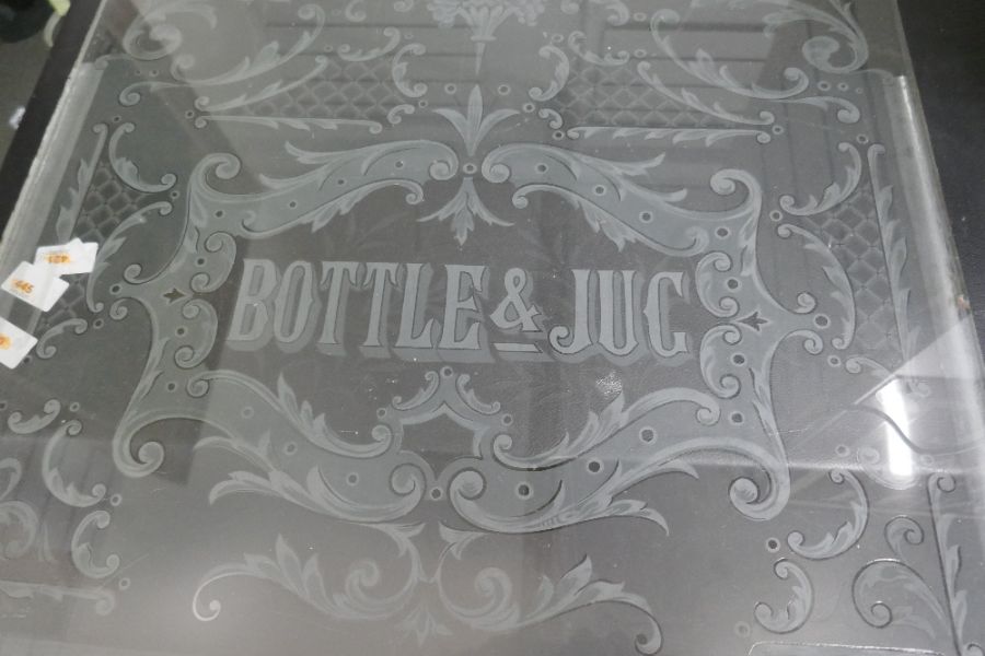 An old glass panel probably for a Public House door, 'Bottle and Jug', 57cm x 91cm - Image 2 of 3