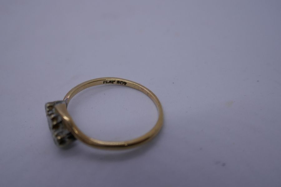 9ct yellow gold crossover design ring set with 3 diamonds in Platinum mount marked '9ct and Plat' si - Image 2 of 2