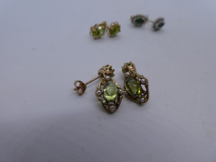 Three pairs of 9ct yellow gold earrings, one a pair cabochon peridot drop example, another a pair o - Image 3 of 3