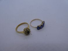 Pretty unmarked yellow metal cluster ring with central sapphire surrounded 8 round cut diamonds size