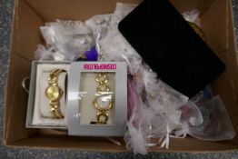 A quantity of costume jewellery to include fashion watches, pewter dog ornament, necklaces, etc