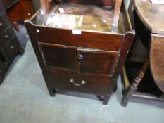 Two antique mahogany commodes and an antique foldover table with drawer