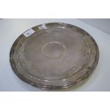 A nice circular sterling silver dish on a raised circular pedestal base, decorative engraving. Marke