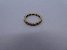 9ct yellow gold eternity ring, inset with synthetic spinel, marked 9ct, 2.3g approx