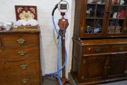 A vintage hand operated rotary gas pump, probably 1950's by William M Wilson & Sons Inc