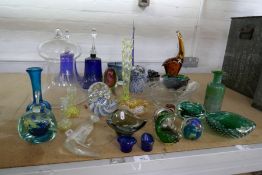 A quantity of coloured and clear glass items