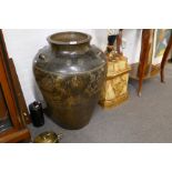 An old Chinese glazed stoneware urn with central border decorated Dragons, 71cm
