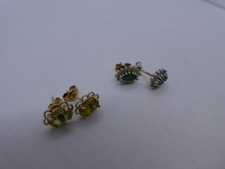 Three pairs of 9ct yellow gold earrings, one a pair cabochon peridot drop example, another a pair o - Image 2 of 3