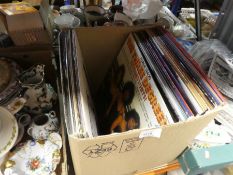 Box of LPs including Bee Gees, Abba, etc and a box of vintage ephemera, newspapers, etc