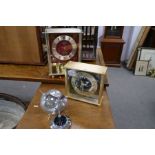A Seiko World time clock, a Citizen mantel clock and a Globular barometer