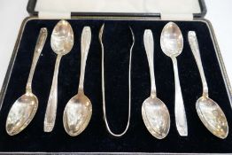 A cased set of six silver teaspoons and silver tongs hallmarked Birmgham 1931, Arthur Price and Co L