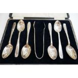 A cased set of six silver teaspoons and silver tongs hallmarked Birmgham 1931, Arthur Price and Co L