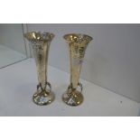 A beautiful neat pair of silver hammered Art Nouveau hand beaten design flute vases. Hallmarked Lond