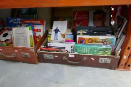 Two suitcases of books to include children's books, autobiographies, manuals, novels, etc