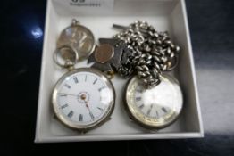 Two silver ladies pocket watches, a silver chain hung with a medallion and a silver cycling medal