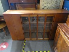 Large mid century teak display unit with glazed doors, drop down compartment and cupboards