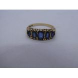 9ct yellow gold ring inset with graduated pale blue oval sapphires, marked 375, 3.6g approx, size Q