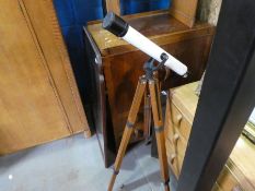 Vintage telescope on teak tripod