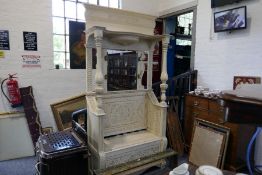 A Victorian carved oak hallstand having mirror back with box seats, height 229cms