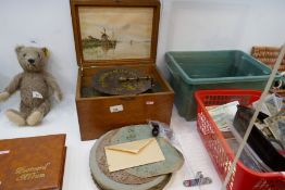 A 19th century oak polyphone by Regina, Number 22 with a quantity of musical discs