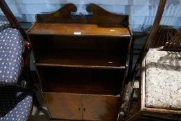 Mahogany free standing bookcase with cupboards below