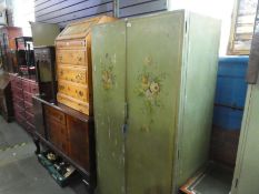 Vintage green painted two door wardrobe decorated with painted floral detail and similar 2 door cupb