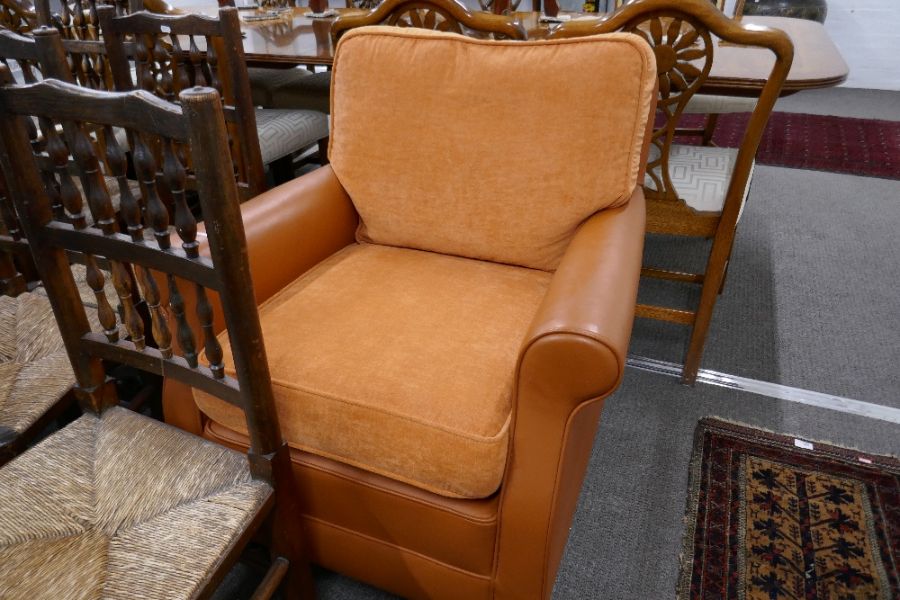 A modern orange leather and fabric armchair - Image 9 of 9
