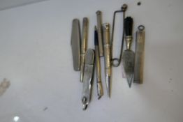 A silver engine turned pencil by Samuel Morden, a silver penknife and other items