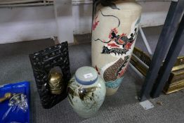 A Chinese brass bell in carved hardwood stand, a large vase decorated dragon and a ginger jar