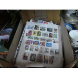 Box of mixed World stamps on pages/envelopes