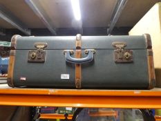 Vintage wood and metal bound suitcase