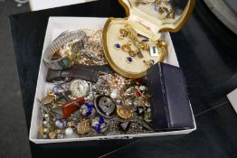 A collection of costume jewellery to include brooches, cufflinks, silver Royal Engineer's and tortoi