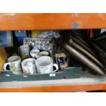 One box of pottery mugs, thimbles, pictures and a wooden folding chair