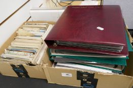 A small box of Victorian and later postcards, and a quantity of First Day Covers