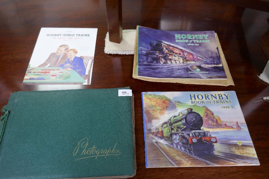 Two catalogues for Hornby Book of trains 1938 - 1940 an album of railway postcards and similar