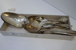 A mixed lot of silver spoons including a pair of serving spoons, teaspoons including Georgian Scotti