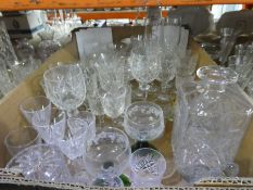 Drinking glasses to include tumblers and wine, decanters, vases and a quantity of Portmeirion 'Botan