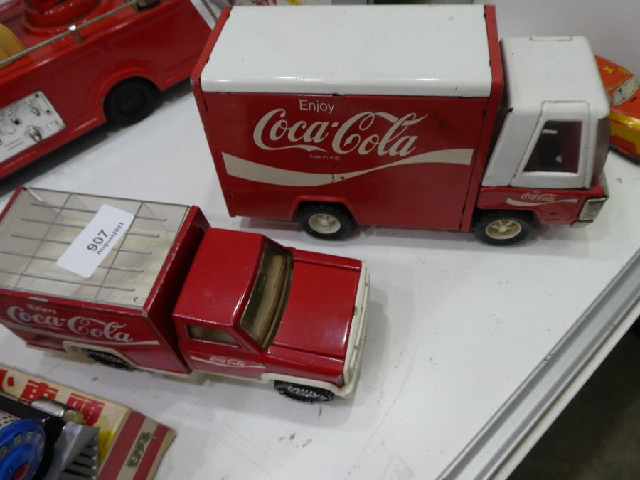 A quantity of vintage tin plate fire engines, Coca Cola trucks and train - Image 4 of 6