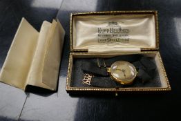 Vintage 18ct 'Moeris' Swiss made wristwatch on a black fabric strap, case marked 18, 1798550, Retail