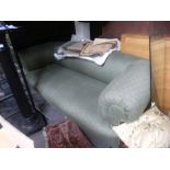 Antique Chesterfield sofa having turned front legs