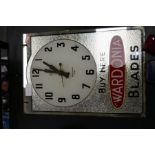 A vintage advertising clock for Wardonia blades and two Ronson cigarette lighters