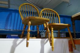 Pair of beech hoop and stick back dining chairs