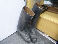 A Pair of vintage black horse riding boots with markings inside saying 9 5G 1793