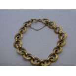 Pretty 9ct yellow gold bracelet with circular links, and safety chain, marked 375, 25g approx