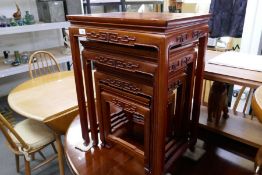 A modern nest of Chinese hardwood coffee tables, width 51cm