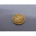 22ct gold half sovereign, dated 1914, George and The Dragon, and Young George, with initials BM