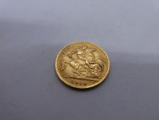 22ct gold half sovereign, dated 1914, George and The Dragon, and Young George, with initials BM