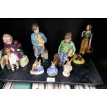 Four Royal Doulton figures, limited edition and 3 rabbit figures